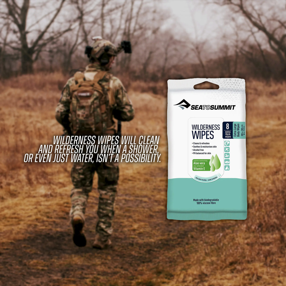 Hiker in camouflage walking a bush track beside a Wilderness Wipes 8 Pack
