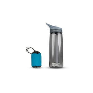 Packed Head Net stuff sack beside a drink bottle to show its small size