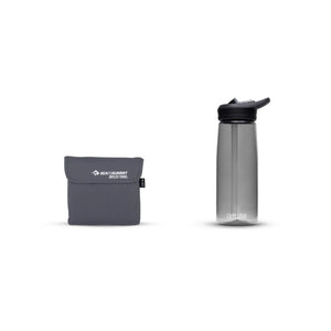 Medium Drylite Towel packed in its pouch next to a drink bottle