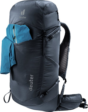 Deuter Speed Lite Pro 30 with a jacket tucked in the mesh front pocket