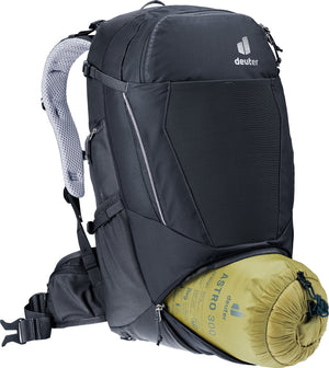 Sleeping bag (not included) going into the base compartment of the Deuter Trans Alpine 30