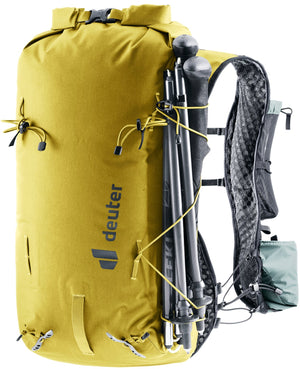 Deuter Vertrail 16 with folded trekking poles held by the bungee cords