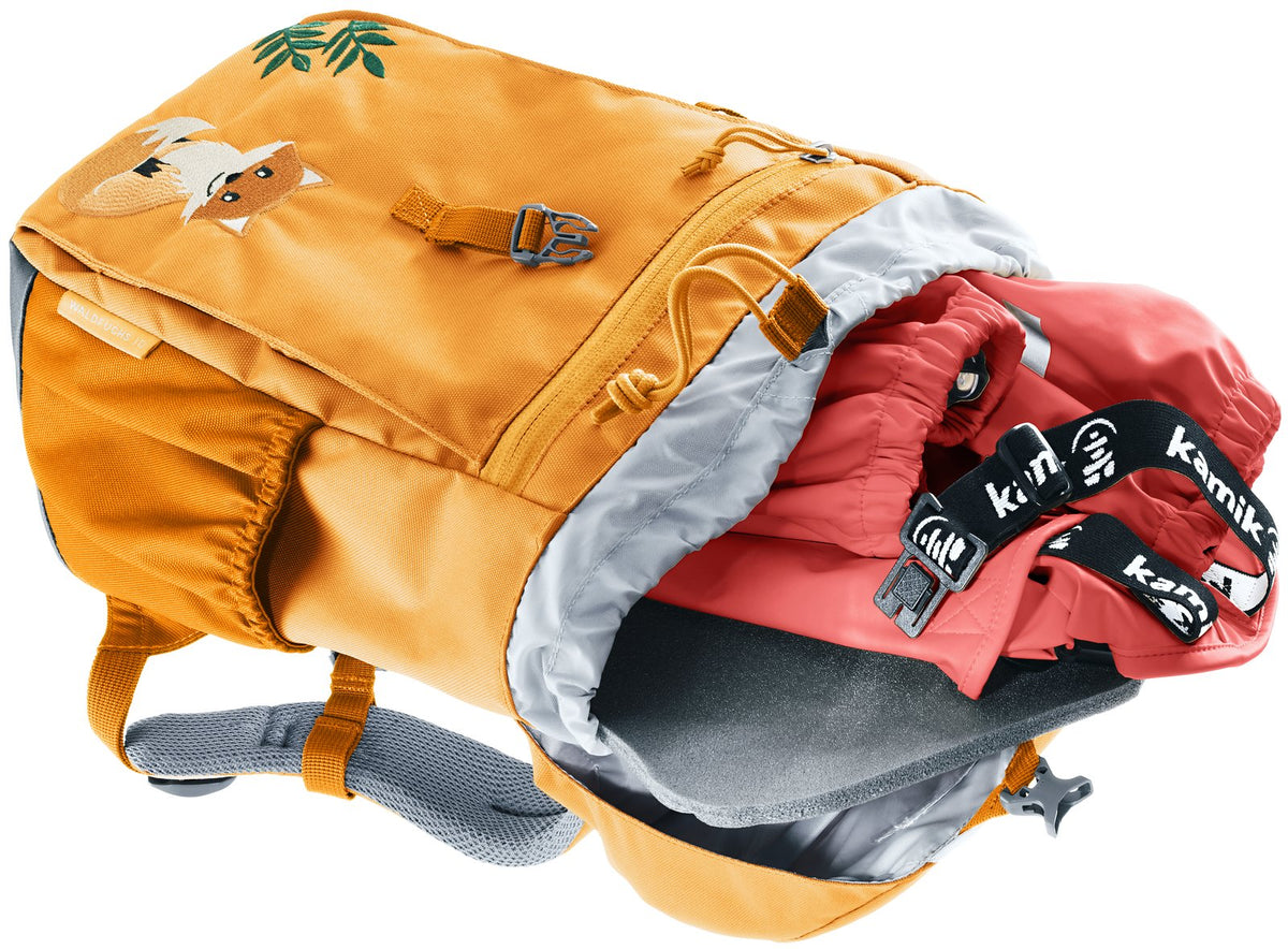 Deuter Waldfuchs 10 lid open with spare clothes packed in the main compartment