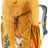 Deuter Waldfuchs 14 kids' backpack in Amber Maple orange with a fox and fern print