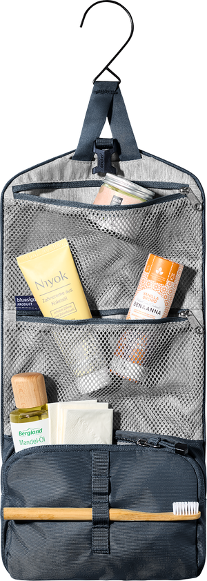 Deuter Wash Bag I in Black hanging open from its hook, showing toiletries in the mesh pockets