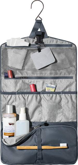 Deuter Wash Bag II hanging open from its hook, showing the mirror, mesh pocket and toiletries in the loops