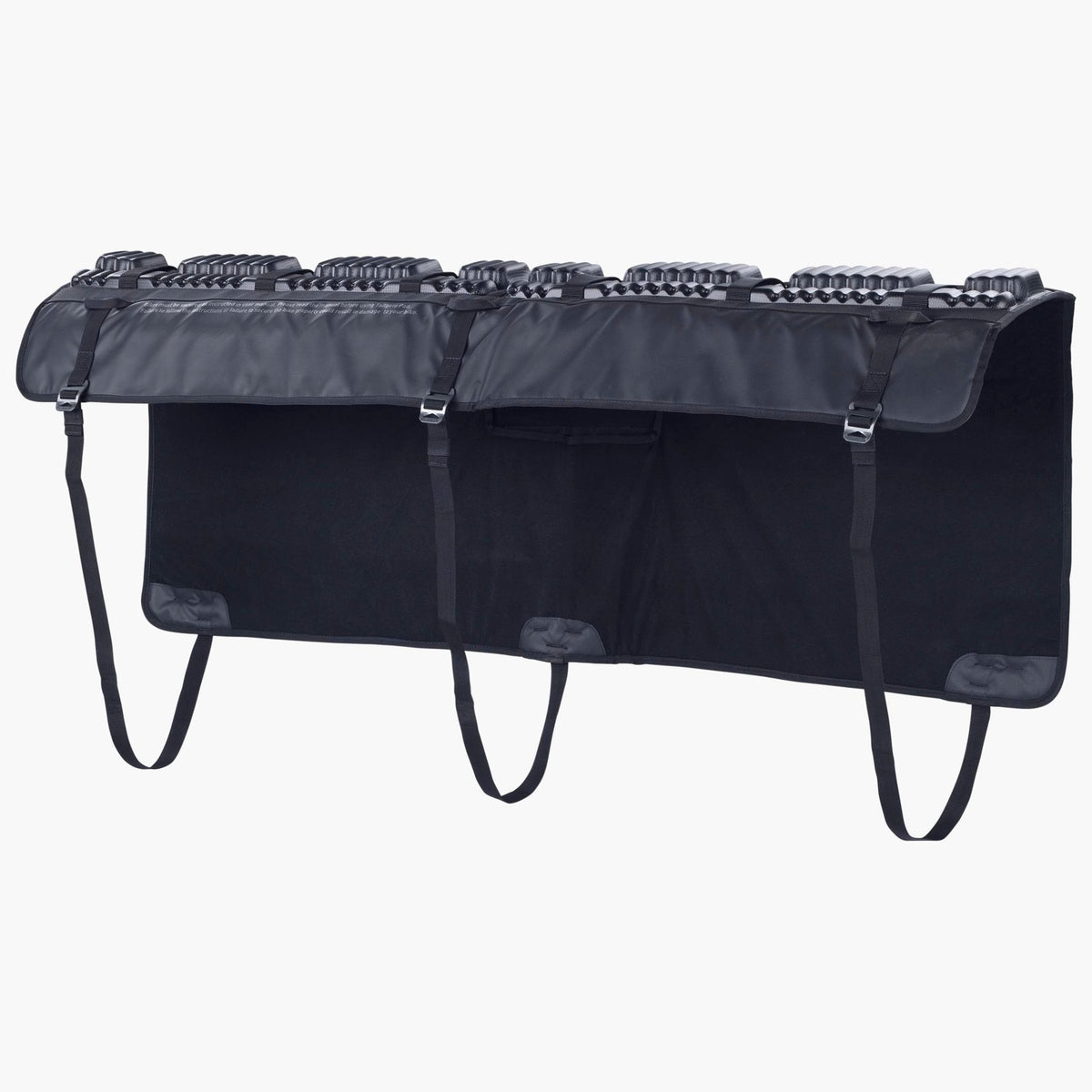 Inside of the black EVOC Tailgate Pad: soft lining, buckled top straps and long tailgate straps
