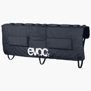 Black EVOC Tailgate Pad, front view with white EVOC logo, fork blocks along the top and lower straps