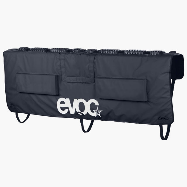 Black EVOC Tailgate Pad, front view with white EVOC logo, fork blocks along the top and lower straps