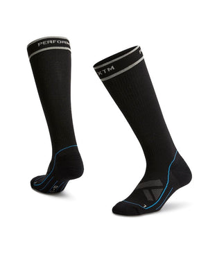 Pair of XTM Compression technical ski socks in Black with grey band at the top and blue foot stripe